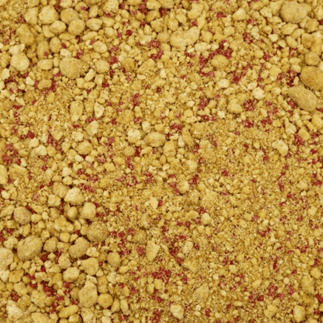 Close up of biscuit crumb, pomegranate sugar pearls